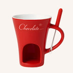 Taza fondue roja con tenedor
